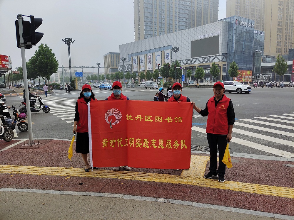 压缩.2021-9-2上午文明交通志愿服务_丹阳牡丹路口 (1).jpg
