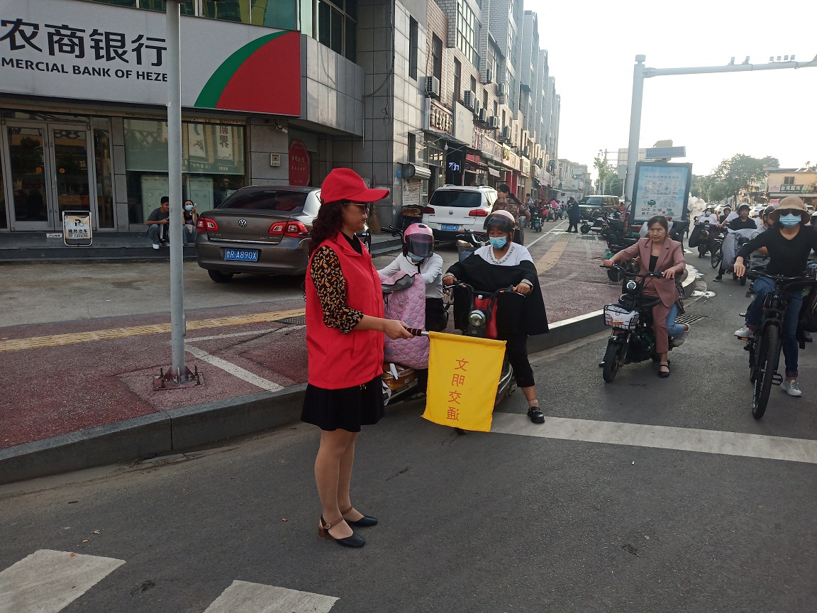 压缩.2021-9-2下午午文明交通志愿服务_丹阳牡丹路口 (5).jpg