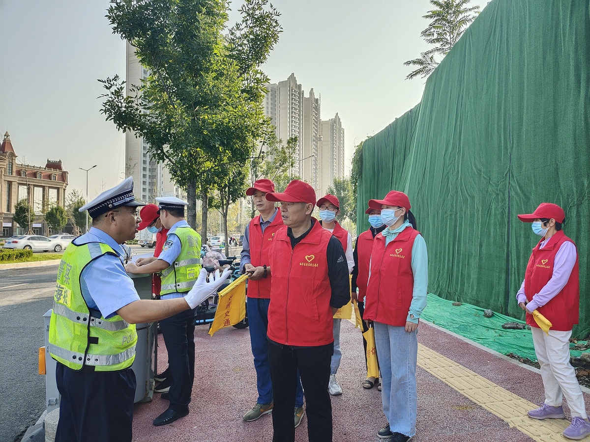 压缩.2021-9-8上午文明交通志愿服务_黄河太原路口 (5).jpg