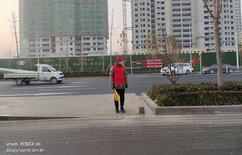 压缩.2021-12-15上午文明交通志愿服务_黄河太原路口 (3).jpg